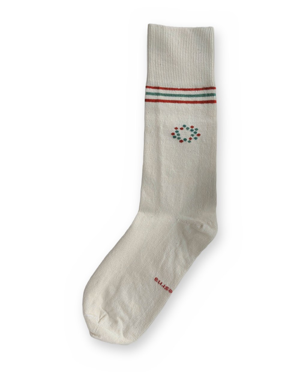 One Care Sock showing the circle of red and teal dots below the striped cuff.
